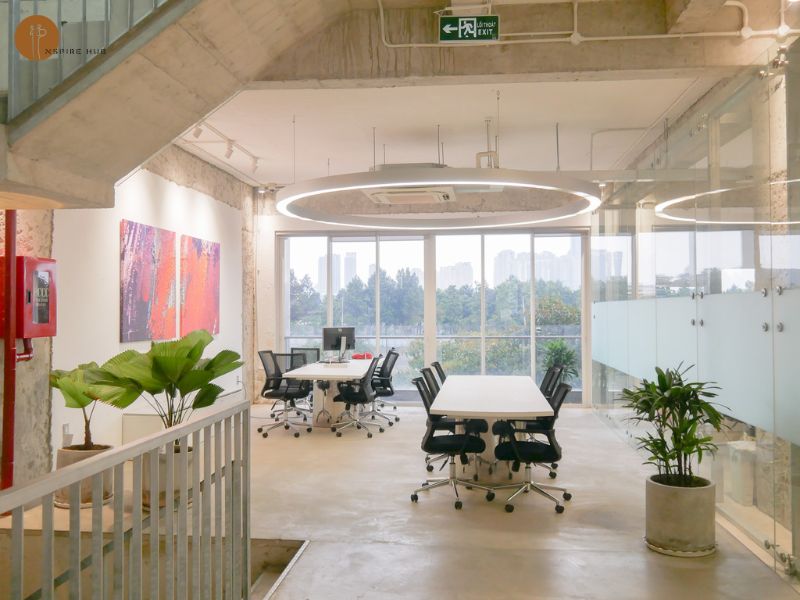 Comfortable dedicated desk workspace at coworking space